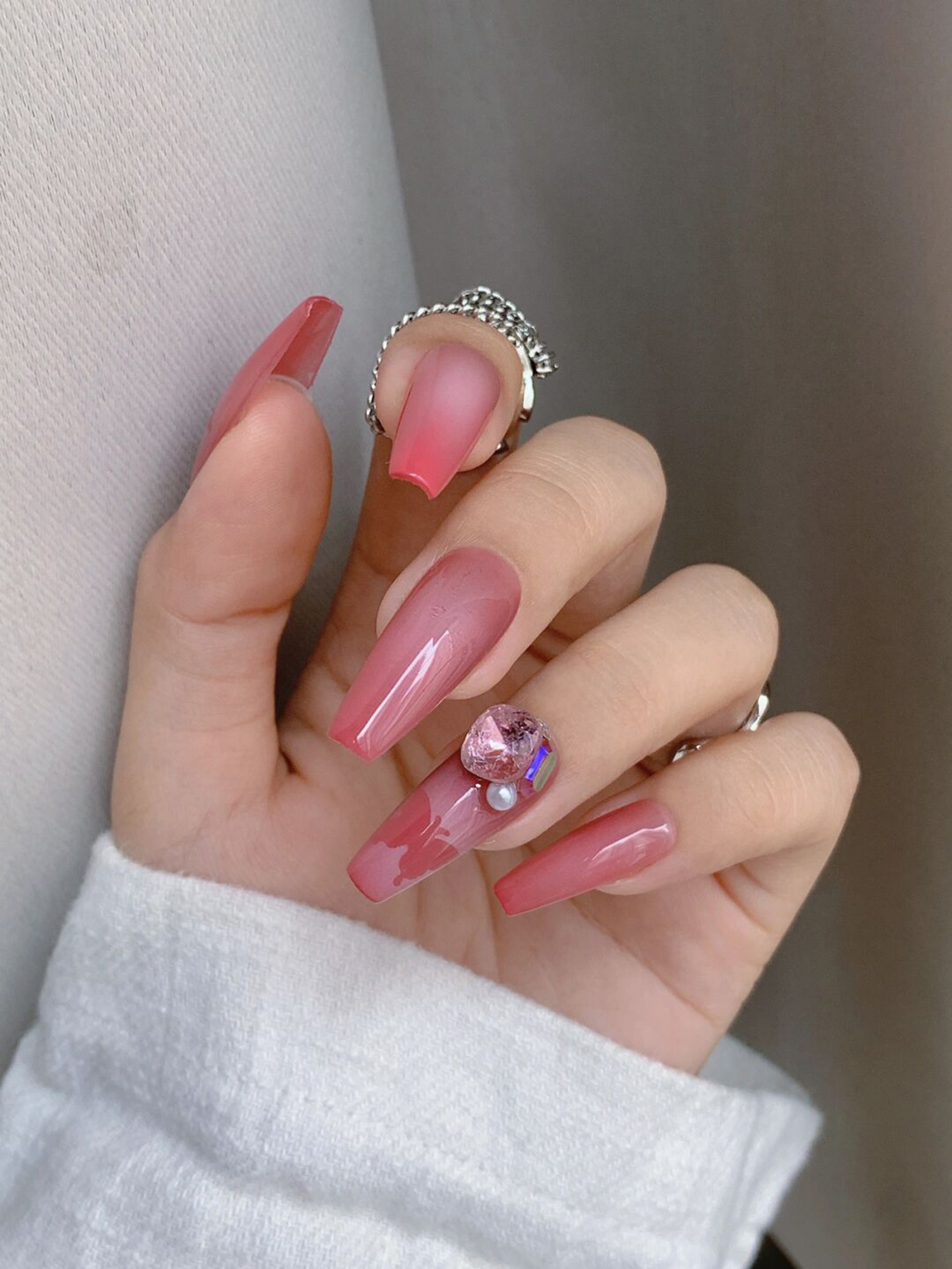 Pink Ombre Long Coffin Nails shown as a nail art design with pink, ombre, coffin and long details.