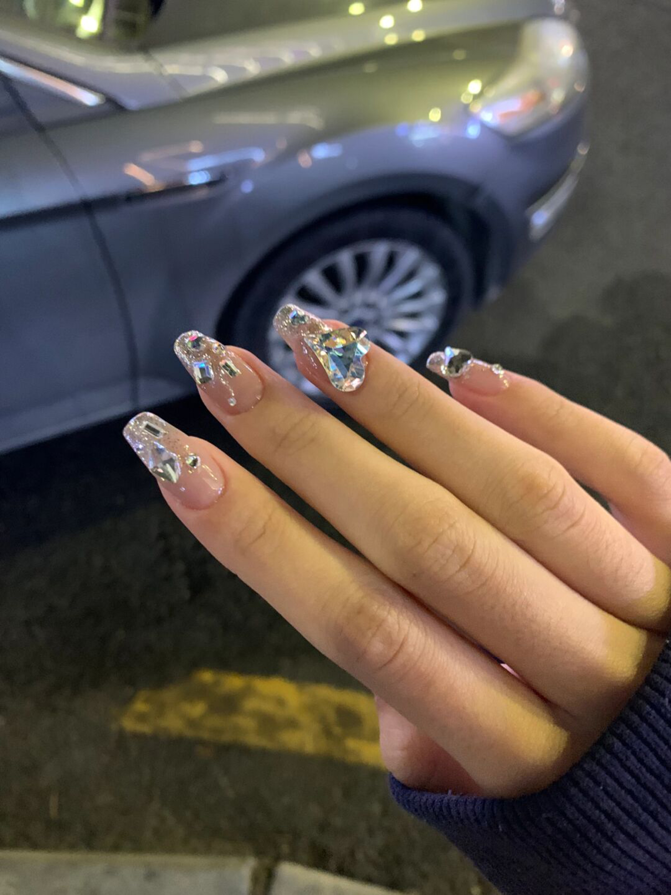 Silver and Nude 3D Long Coffin Nails shown as a nail art design with silver, nude, 3d, elegant, coffin and long details.