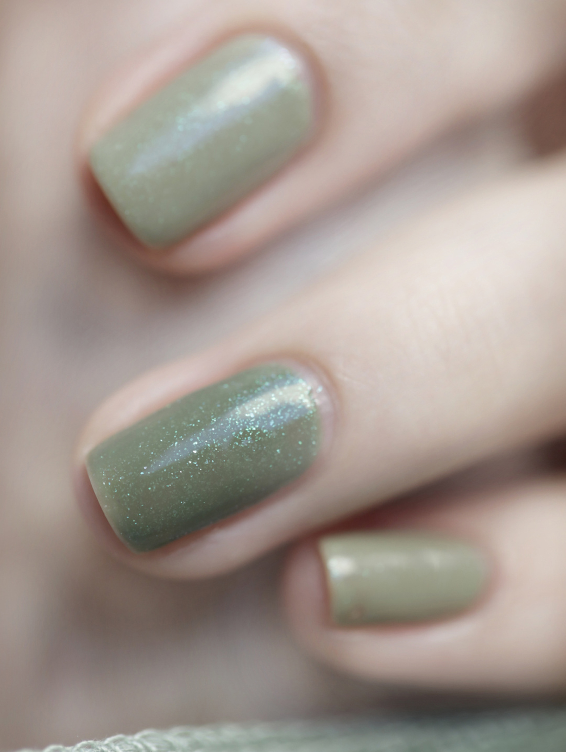 Green Glitter Short Square Nails shown as a nail art design with green, glitter, simple, square and short details.