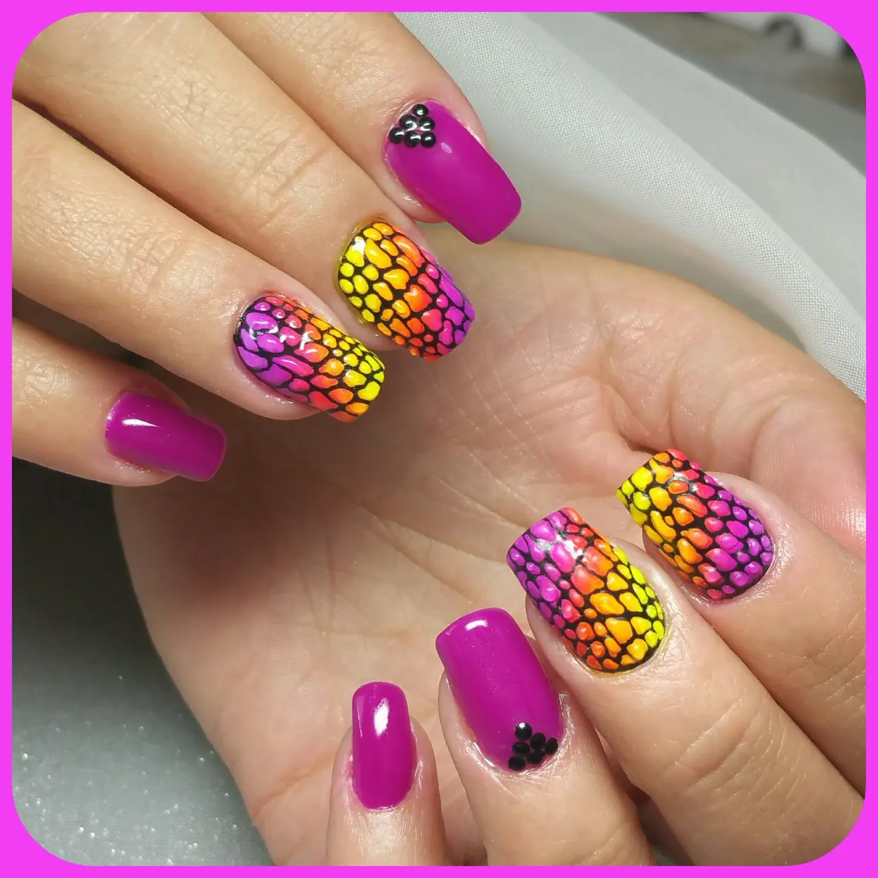 Fuchsia square nails with neon yellow orange and pink polka-dot accent art